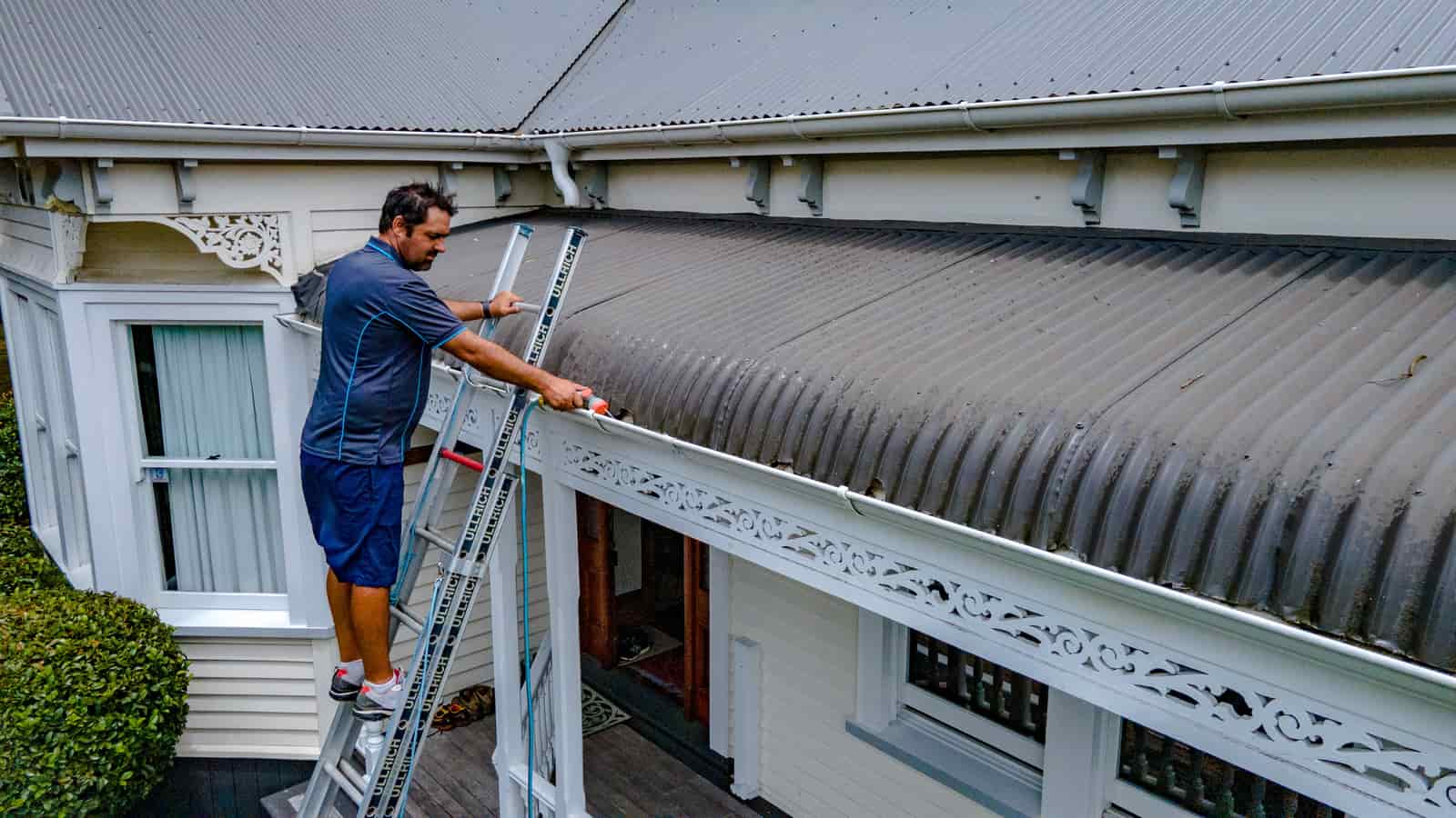 A Lindab ladder bracket mounted neatly along a roof access point.