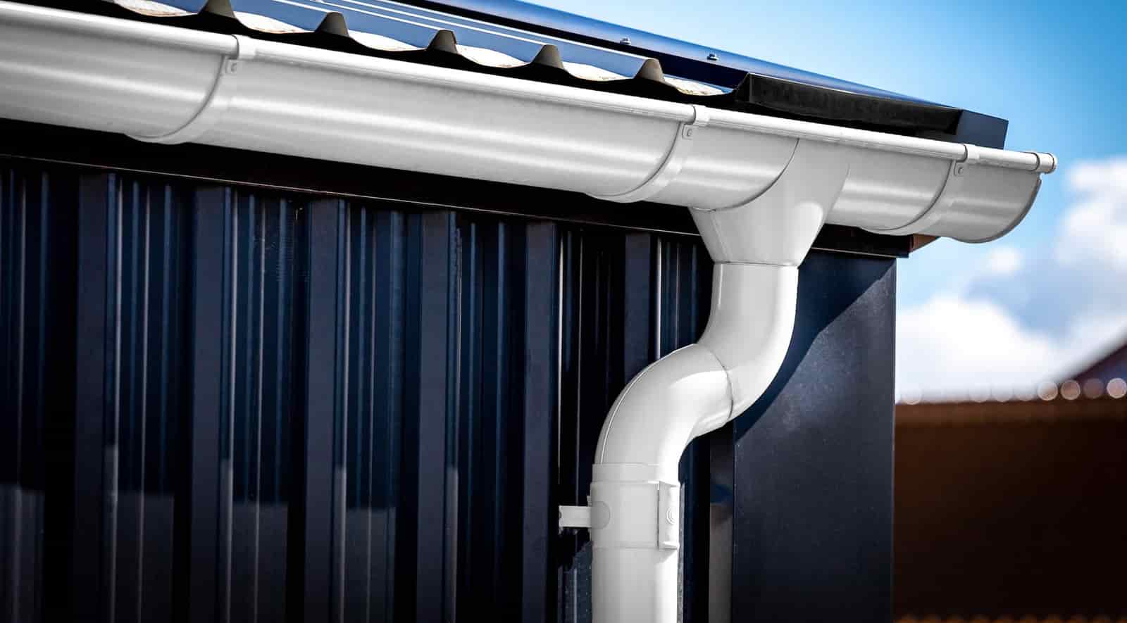 European guttering detail photographed across a residential roofline.